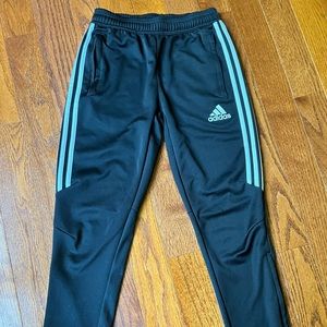 Black and white Adidas warm up pants. Boys large.